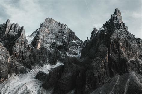 Mountains Under Grey Sky · Free Stock Photo