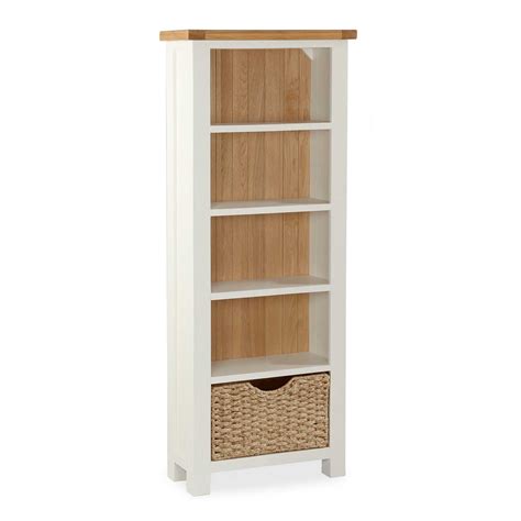Daymer Cream Painted Slim Bookcase With Basket Roseland Furniture