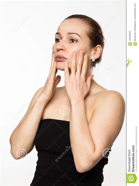 Prevention Of Skin Aging Woman Performs Exercises For A Face Building