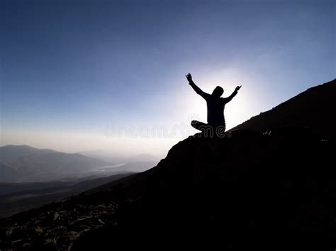Man Begging And Praying To God On Top Of Mountains Stock Image Image