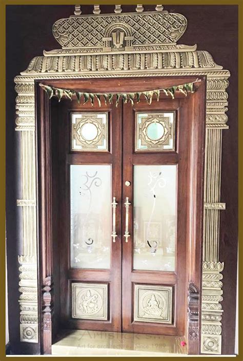 An Ornate Wooden Door With Glass Panels