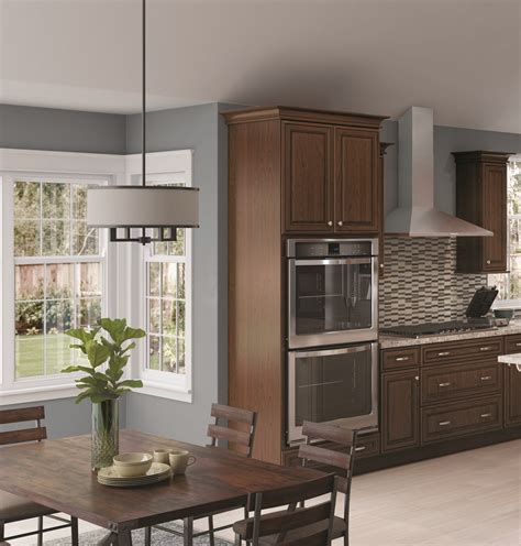 A Trend We Love Is Pairing Warm Glazed Cherry Cabinets With Fresh Grey