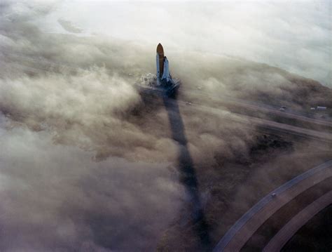 The Space Shuttle Challenger Rolls Through The Fog Toward The Launch