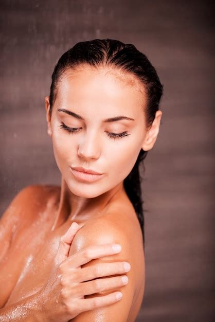 Premium Photo Beauty In Shower Beautiful Young Shirtless Woman Standing In Shower And Washing