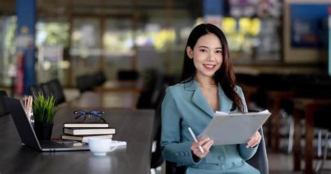 Young Asian Business Woman Beautiful Charming Smiling Sitting Working