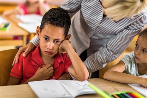 Children Arguing In Classroom