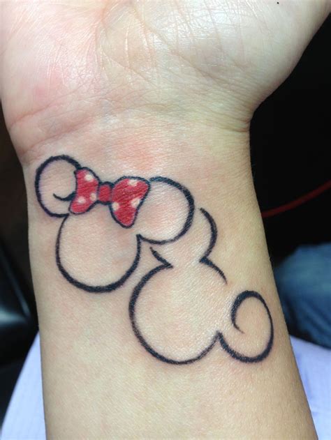 Outline Mickey And Minnie Tattoos On Wrist Small Tattoos Men Disney