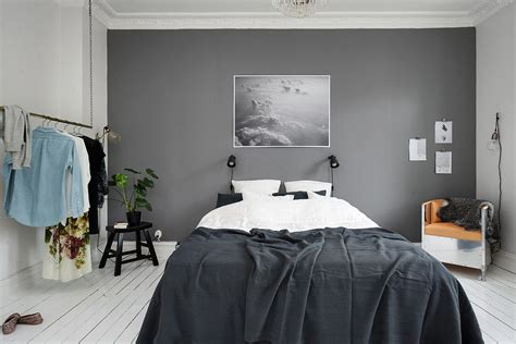 Keep the majority of your walls white, pick white bed linen and white furniture too, then add pops of grey to match your feature wall with your soft furnishings. Bedroom with a grey wall - COCO LAPINE DESIGNCOCO LAPINE ...