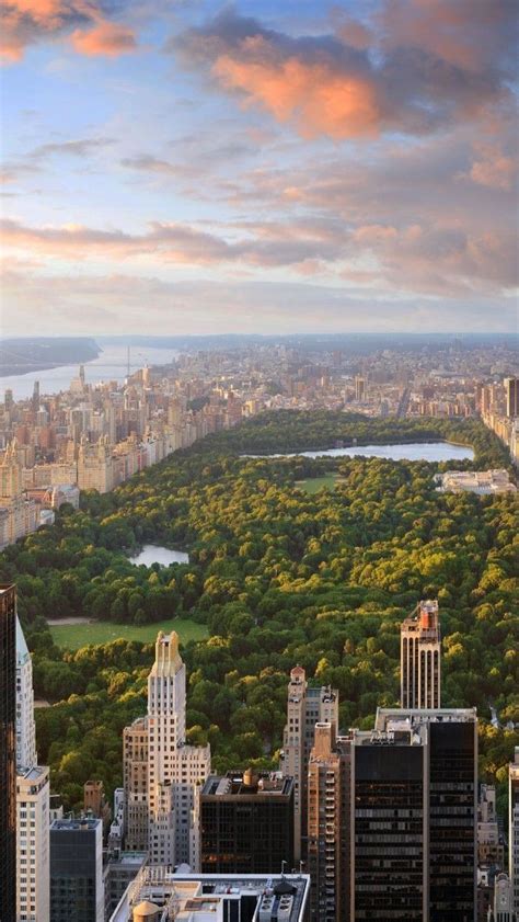 An Aerial View Of New York City With Central Park In The Foreground And