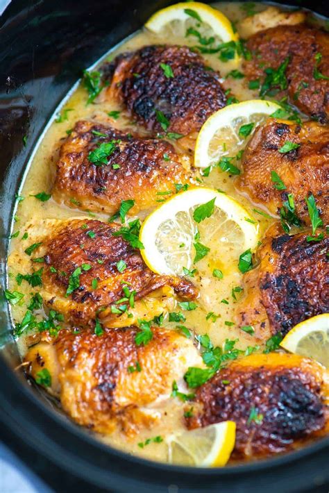 Chicken thighs stay moist and succulent during slow cooking, infusing the accompanying vegetables with superb flavor. Ultimate Slow Cooker Lemon Chicken Thighs | Recipe | Slow ...