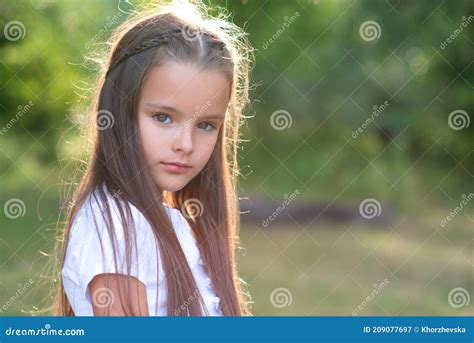 Pretty Little Girl With Long Brown Hair Posing Summer Nature Outdoor