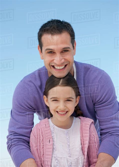 Portrait Of Father Embracing Daughter 8 9 Stock Photo Dissolve