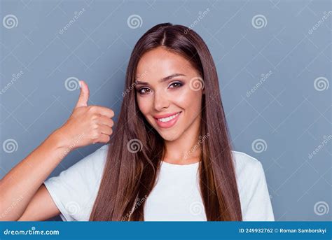Portrait Of Gorgeous Cheerful Lady Arm Finger Demonstrate Thumb Up Toothy Smile Isolated On Grey