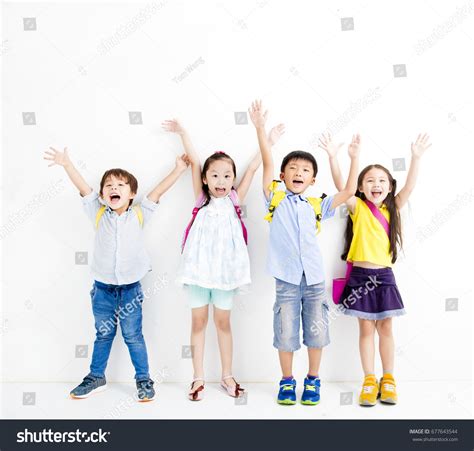 Group Happy Smiling Kids Raise Hands Stock Photo 677643544 Shutterstock