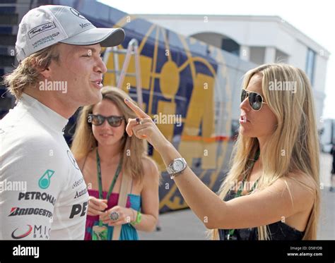 German Driver Nico Rosberg Of Mercedes Gp L And His Girlfriend Vivian