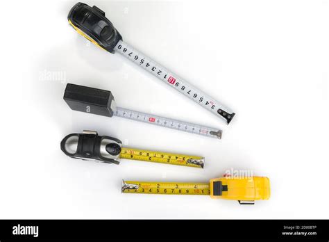 Measure Tapes On A White Background Inches And Centimeters Stock Photo