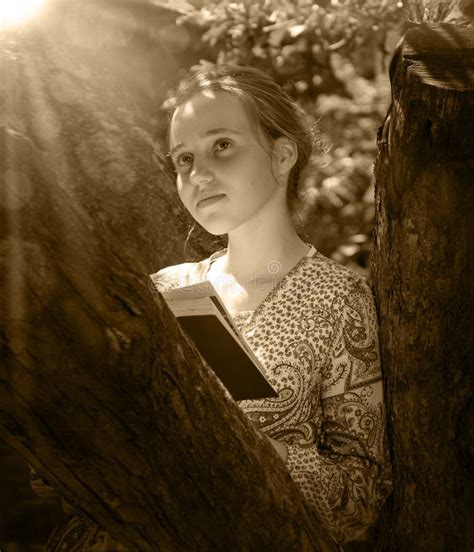 Cute Girl Reading A Book Under A Tree Stock Image Image Of Lifestyle