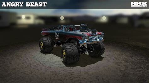 A Green Monster Truck With Big Tires In The Dark