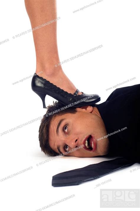 Womans Foot On A Mans Head Stock Photo Picture And Rights Managed