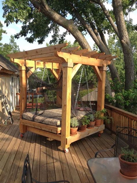 18 Restful Outdoor Swinging Bed Designs