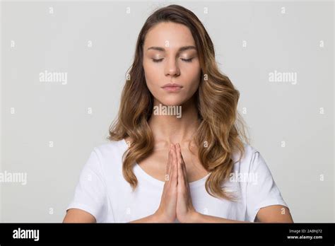 Calm Peaceful Woman With Closed Eyes Meditating Practicing Yoga Stock