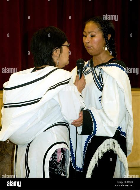 Two Face To Face Inuit Women Give A Display Of The Distinctive Inuit