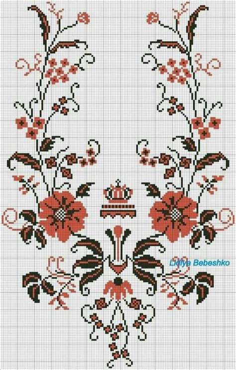 A Cross Stitch Pattern With Red Flowers And Leaves