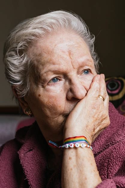 Premium Photo Old Lesbian Woman With Nostalgic Look And Rainbow