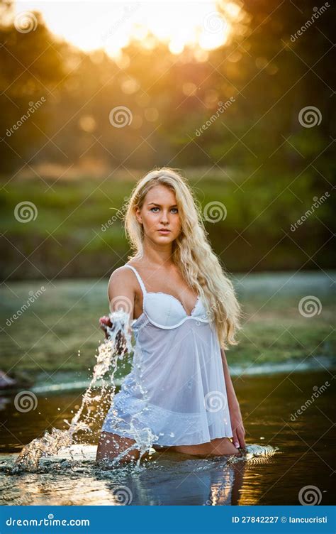 Blonde Woman In Lingerie In A River Water Royalty Free Stock Photography Image