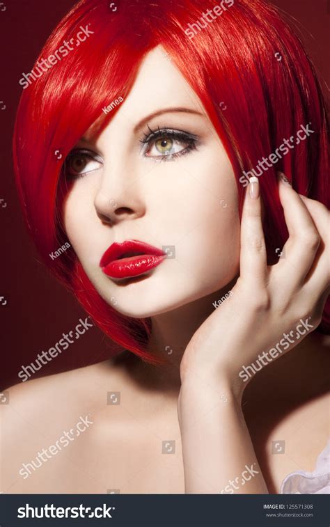 Beautiful Woman With Shiny Red Hair Stock Photo 125571308