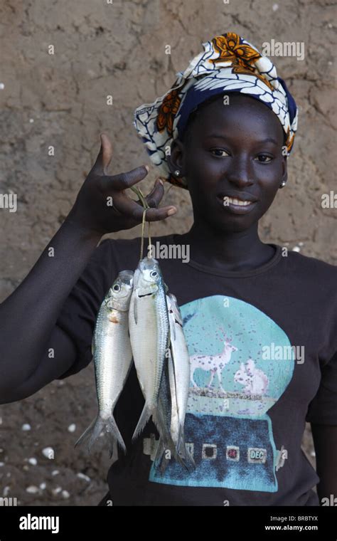 Woman Holding Fish Kafountine Casamance Senegal West Africa Stock