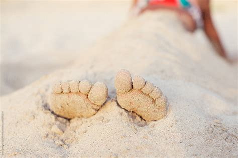 Sandy Toes Of A Babe Girl Sitting On A Beach By Stocksy Contributor Anya Brewley Schultheiss