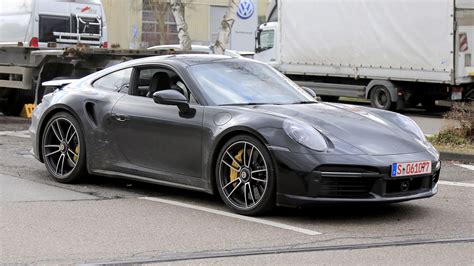 The porsche 911 (pronounced nine eleven or in german: New Porsche 911 Turbo S spied before reveal at 2020 Geneva ...