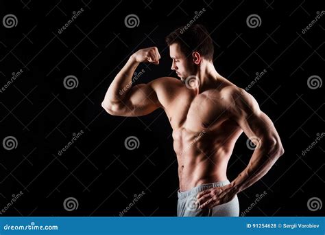 Muscular And Torso Of Young Man Having Perfect Abs Bicep And Chest