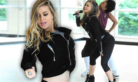 Carmen Electra Prowls Around In A Midriff Baring Tracksuit As She