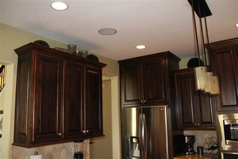 Kitchen cabinets to the ceiling or not. Are you having trouble decorating that gap between your kitchen cabinets & the ceiling above ...