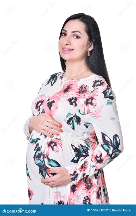 Portrait Of Beautiful Pregnant Woman Posing Isolated On White