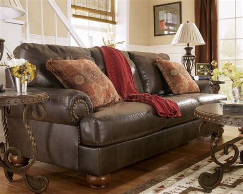 Truffle Color Rustic Living Room With Nailhead Deatils By