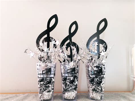 Plenty of kids clothing to choose from. Music centerpieces | Music party decorations, Music themed ...
