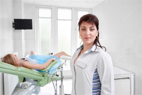 premium photo professional gynecologist examining her patient