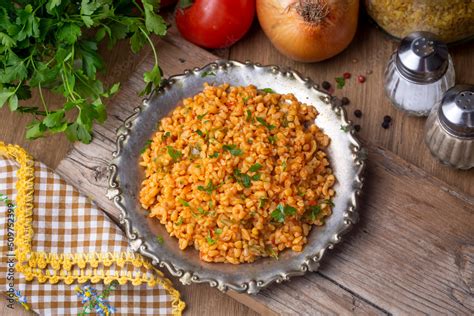 Traditional Turkish Bulgur Pilaf With Tomato Sause In Plate Turkish