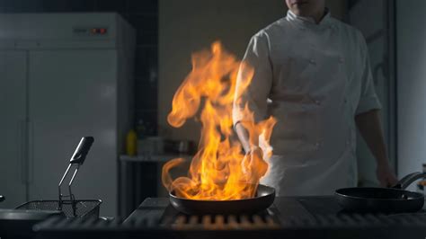 Chef Prepares Flambe On Hot Pan In Slow Stock Footage Sbv