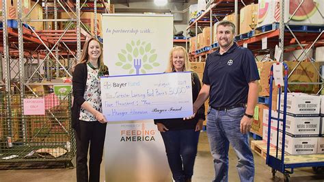 Give locally find food volunteer. Food grant provided to Greater Lansing Food Bank