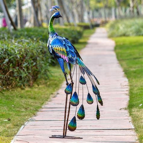 This amazing looking peacock does not appear like it is a recycled craft by the look and appeal it let the paint of the spoons dry completely. TERESA'S COLLECTIONS 35 inch Metal Peacock Garden Statues ...