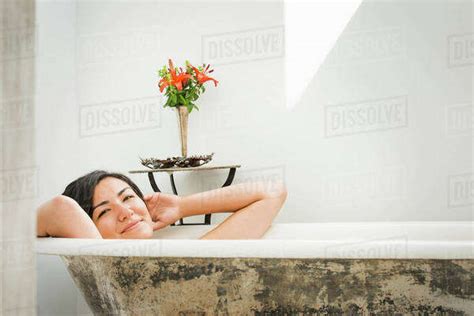 Woman Relaxing In Bubble Bath Stock Photo Dissolve
