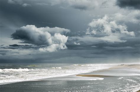 Cloudy Beach Pictures Download Free Images On Unsplash