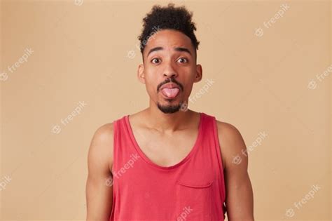 Free Photo Teenage African American Funny Looking Man With Afro