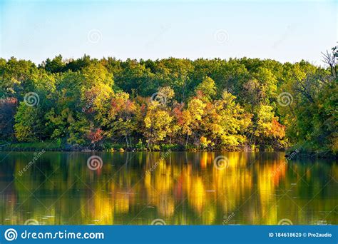 Quiet Lake In Autumn Forest Among The Autumn Yellowing Trees Stock