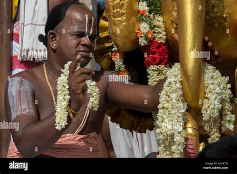 Brahmin Priest On Float Chariot Blessing Devotees In Downtown Stret