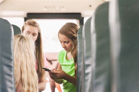 School Bus Girls On Bus Talking And Using Cell Phone By Sean Locke